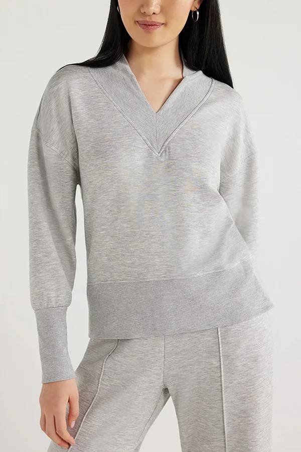 Conjunto de top de cuello en V y pantalones de estar por casa con bolsillos y cintura elástica de color liso para el frío 