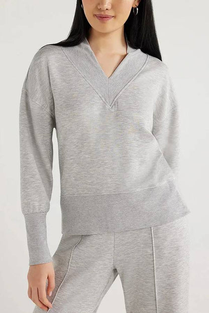 Conjunto de top de cuello en V y pantalones de estar por casa con bolsillos y cintura elástica de color liso para el frío 