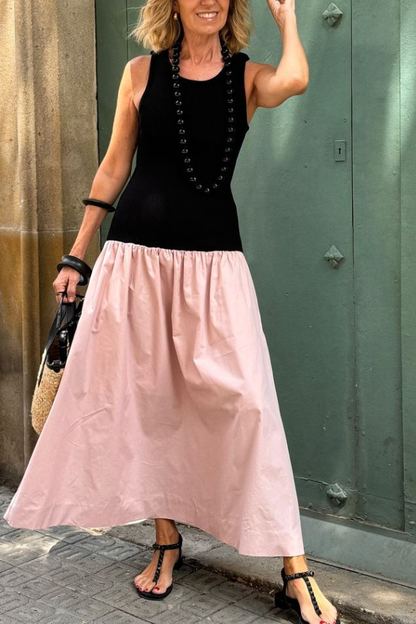 Vestido largo de punto negro sin mangas con dobladillo suelto rosa