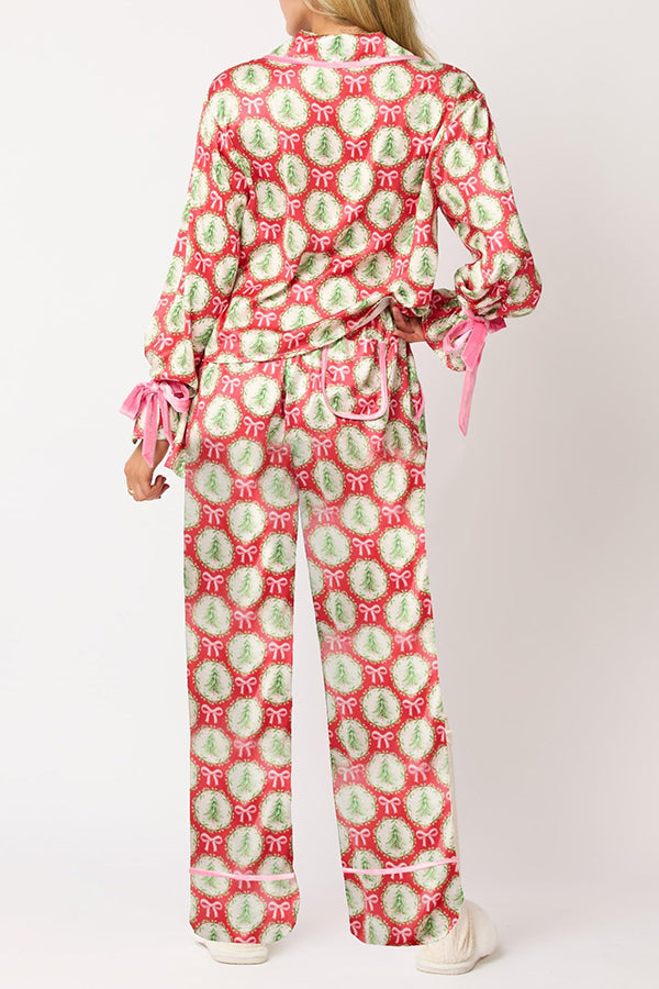 Conjunto de top de terciopelo con estampado navideño, manga larga, bolsillos y pantalones anchos con cintura elástica.