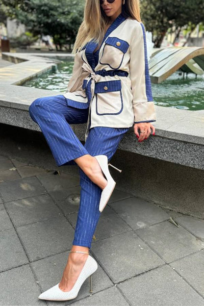 Conjunto de top con bolsillo con solapa y cordón de retazos de Halston y pantalón holgado con cintura elástica a rayas