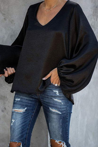 Tops con cuello en V y mangas abullonadas