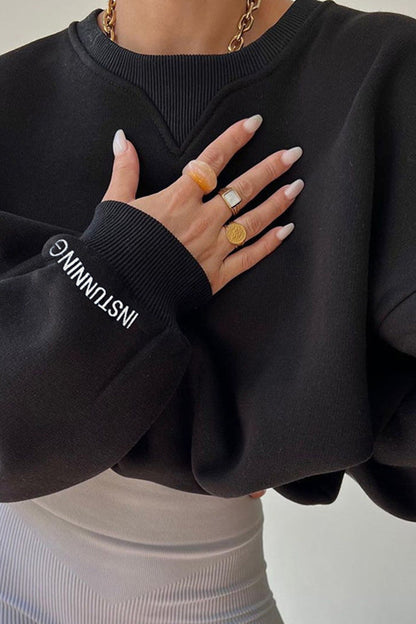 Sudadera versátil con cuello acanalado holgado