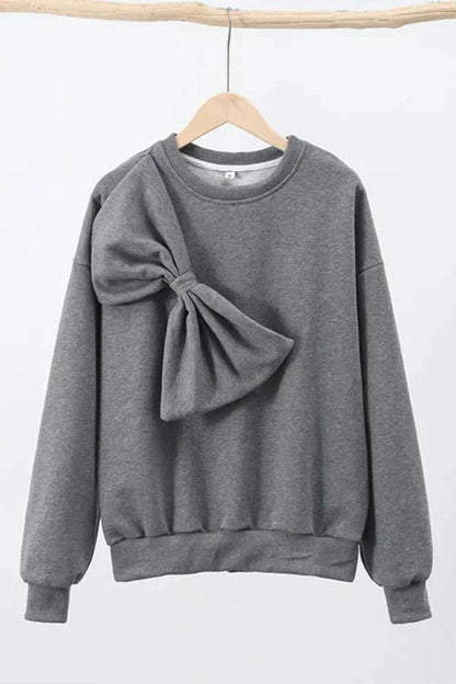 Sudadera holgada de color liso con cuello redondo, manga larga y lazo
