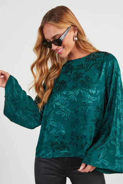 Top de manga ancha con relieve Odette