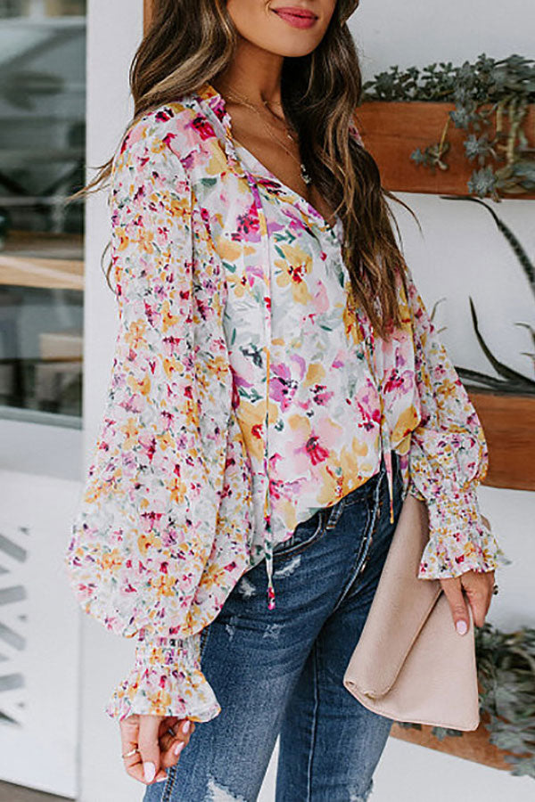 Blusa con mangas globo y estampado de flores dulces