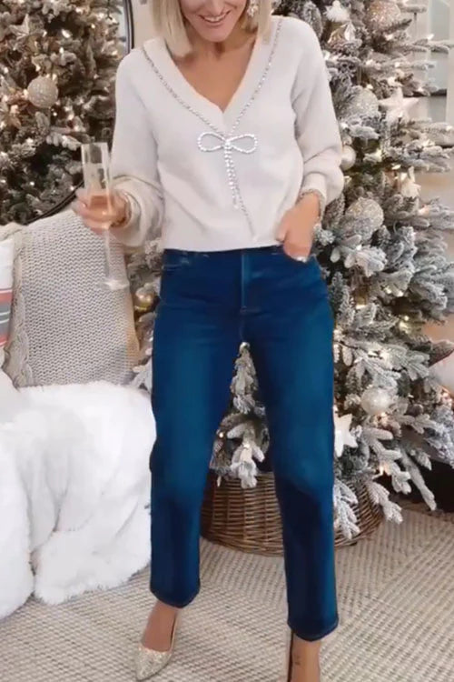 Suéter con lazo elegante