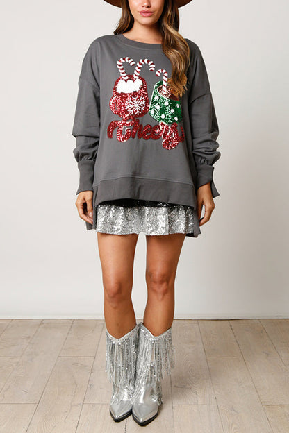 Sudadera informal holgada con lentejuelas y taza de dulces navideños