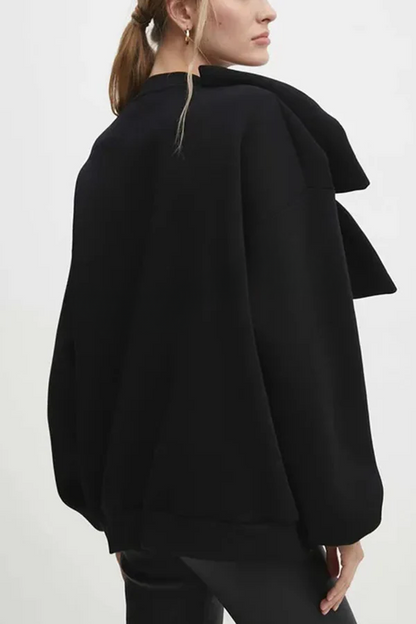 Sudadera holgada de color liso con cuello redondo, manga larga y lazo