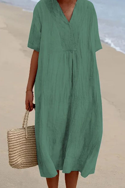 Vestido suelto de manga corta con cuello en V liso