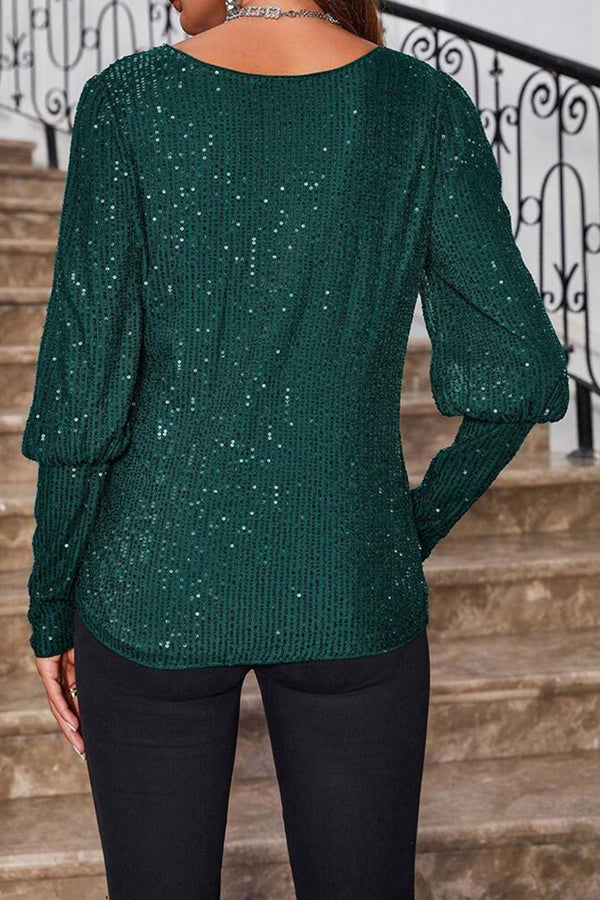 Top holgado de manga larga con cuello redondo y lentejuelas de color liso