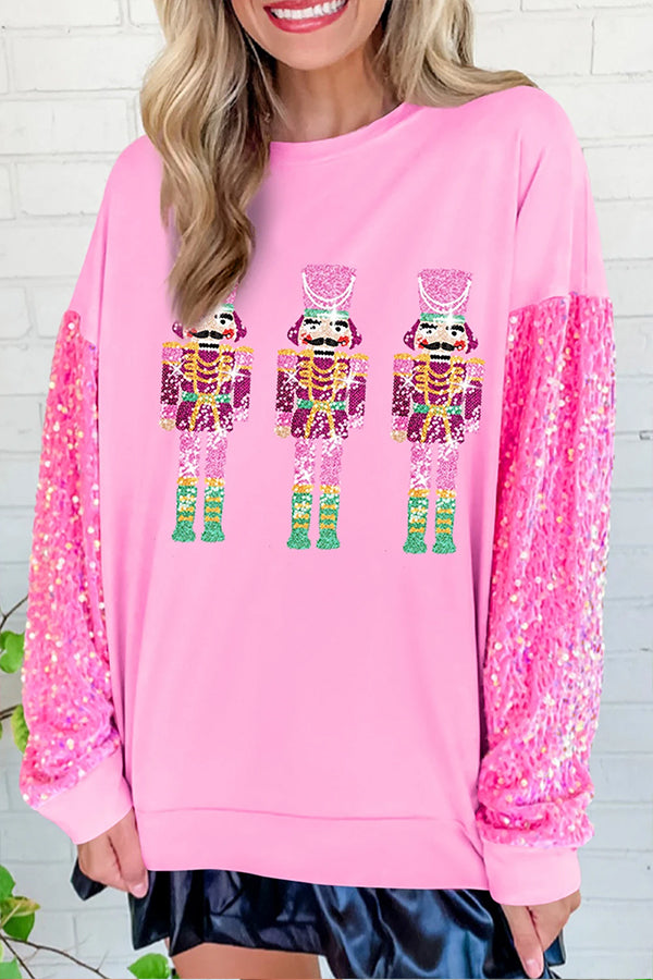 Sudadera con estampado de patchwork y mangas de lentejuelas de Cascanueces en color rosa