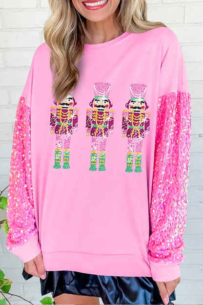 Sudadera con estampado de patchwork y mangas de lentejuelas de Cascanueces en color rosa