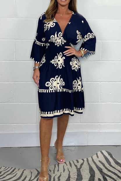 VESTIDO ESTAMPADO CON CUELLO EN V