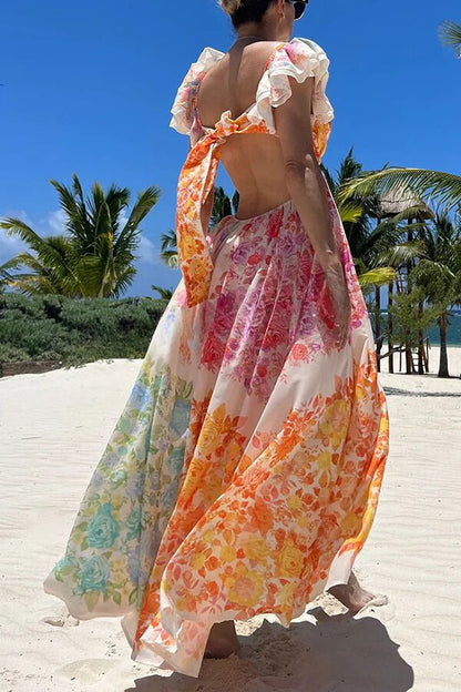 Vestido largo con volantes florales multicolores y espalda recortada con lazo Blooming Beauty