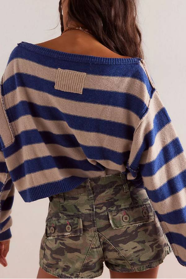 Suéter de punto holgado de manga larga con cuello redondo y estampado de rayas