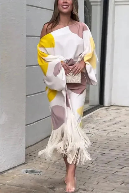 Conjunto de top holgado con mangas globo y falda con flecos con estampado único