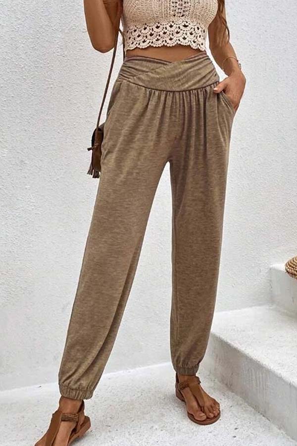 Pantalones casuales de cintura alta con bolsillos sueltos y temperamento