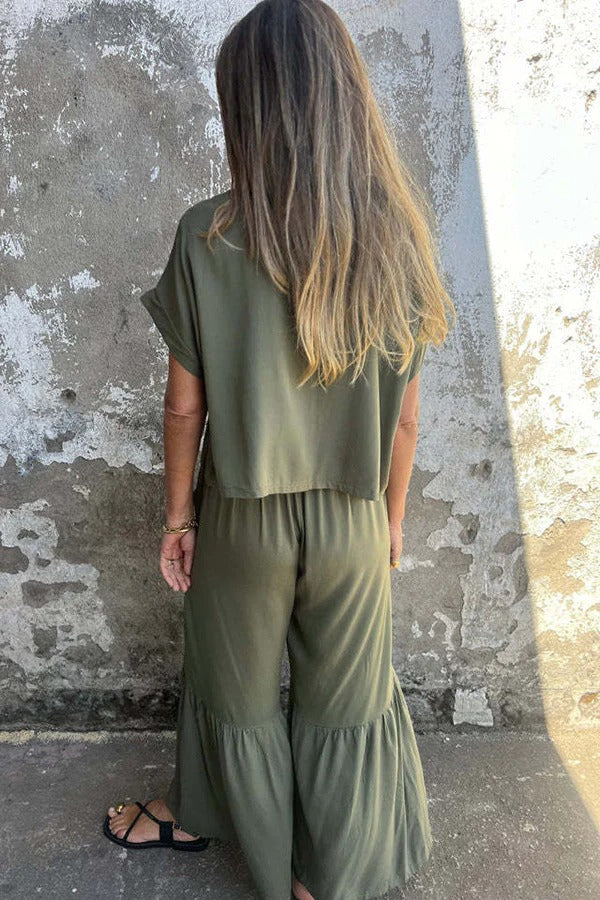 Conjunto de top casual de manga corta con cuello redondo y cintura elástica con bolsillo para atar y pantalones anchos de color liso