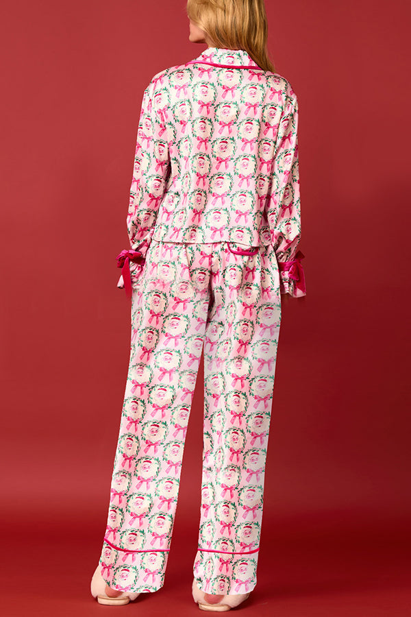 Conjunto de top de terciopelo con estampado navideño, manga larga, bolsillos y pantalones anchos con cintura elástica.