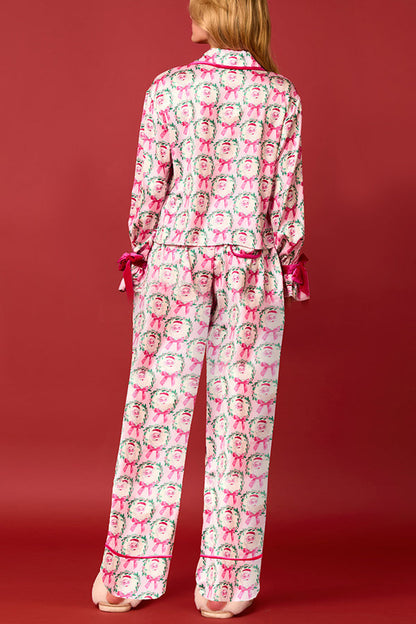 Conjunto de top de terciopelo con estampado navideño, manga larga, bolsillos y pantalones anchos con cintura elástica.