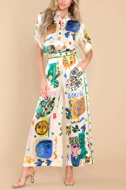 Blusa extragrande con botones y estampado único de satén de Sun Tribe