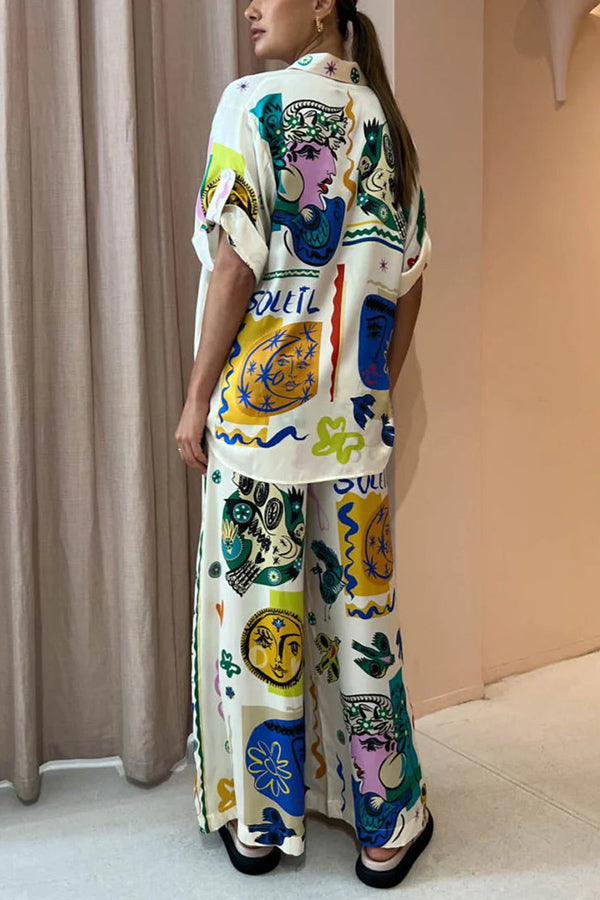 Blusa extragrande con botones y estampado único de satén de Sun Tribe