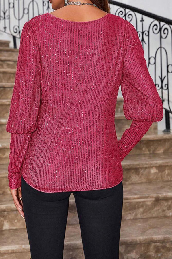 Top holgado de manga larga con cuello redondo y lentejuelas de color liso