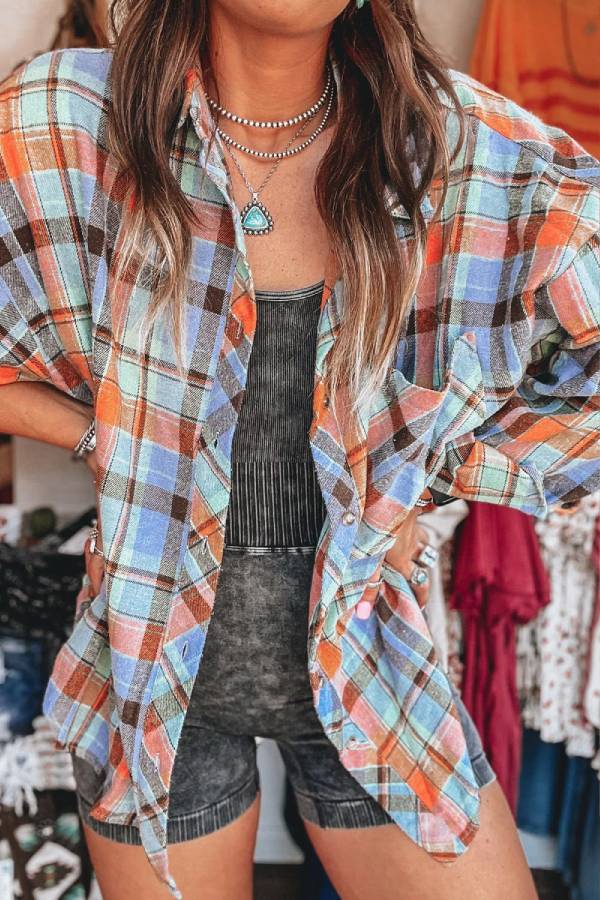 Camisa holgada con bolsillo y estampado de cuadros naranjas 
