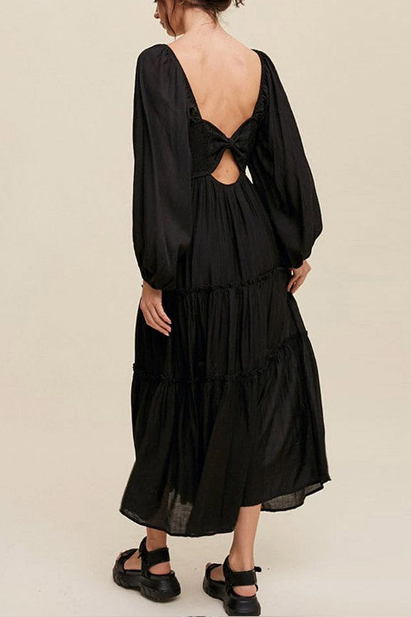 Vestido largo escalonado con volantes, escote en V y lazo