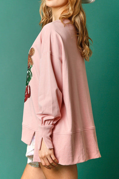Sudadera informal holgada con lentejuelas y taza de dulces navideños