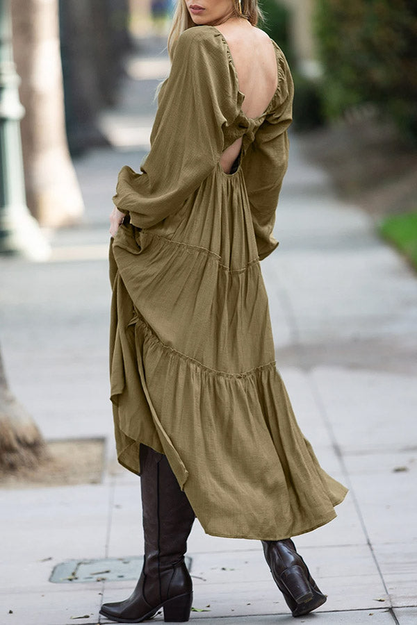 Vestido largo escalonado con volantes, escote en V y lazo