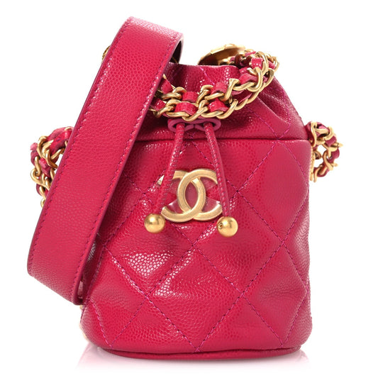 Caviar Quilted Twist Your Buttons Mini Bucket Bag Fuchsia