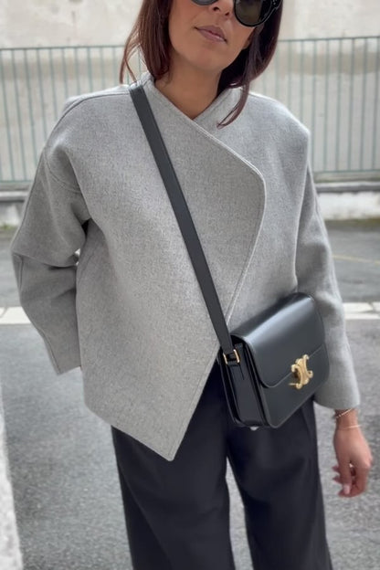 Chaqueta holgada de manga larga con solapa de lana sintética, minimalista y estructurada
