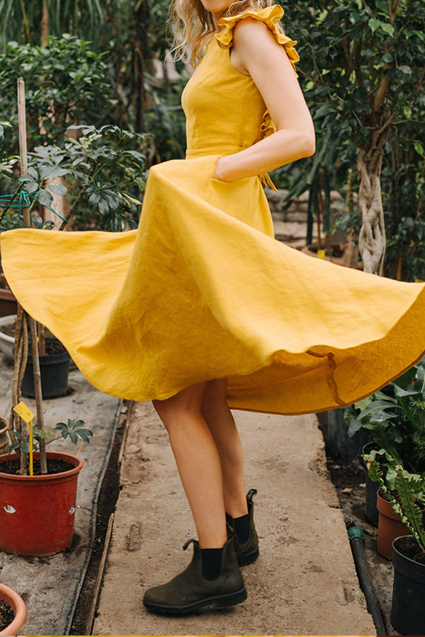 VESTIDO DE LINO CON MANGAS CON VOLANTES Y ESPALDA DESCONECTADAS