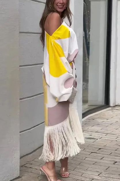 Conjunto de top holgado con mangas globo y falda con flecos con estampado único