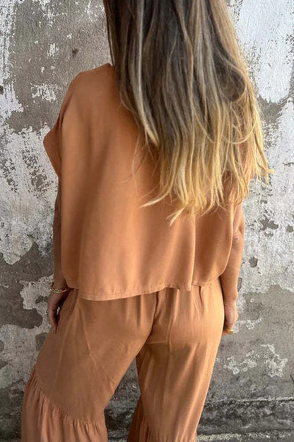 Conjunto de top casual de manga corta con cuello redondo y cintura elástica con bolsillo para atar y pantalones anchos de color liso