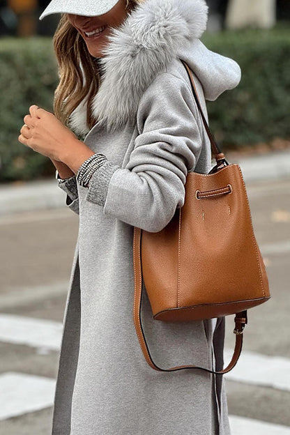 chaqueta holgada con capucha y cordones