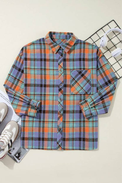 Camisa holgada con bolsillo y estampado de cuadros naranjas 