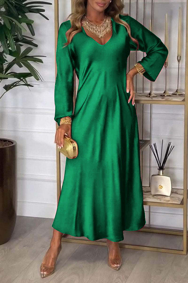 Vestido largo holgado con cuello en V, manga larga y drapeado en color liso
