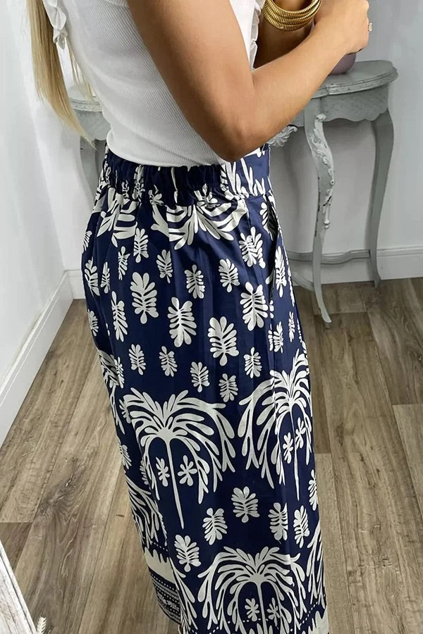 Pantalones anchos de pierna para vacaciones con bolsillo suelto y cintura elástica con estampado único
