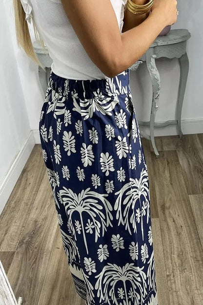 Pantalones anchos de pierna para vacaciones con bolsillo suelto y cintura elástica con estampado único