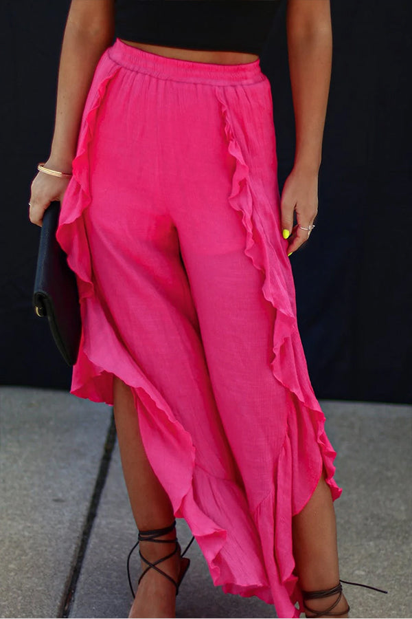 Pantalones anchos de cintura alta con abertura y volantes de rosas