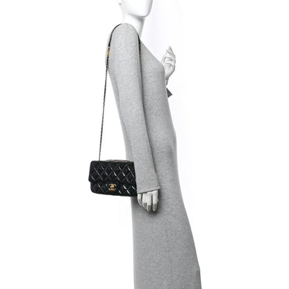 Patent Goatskin Quilted Medium CC Eyelet Flap Blue