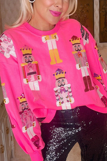 Sudadera holgada con estampado de Cascanueces colorido y tradiciones navideñas