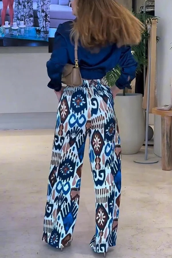 Pantalones anchos con bolsillo y cintura elástica en la espalda con estampado único de Emelia