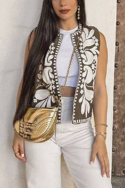 Chaqueta bordada sin mangas 