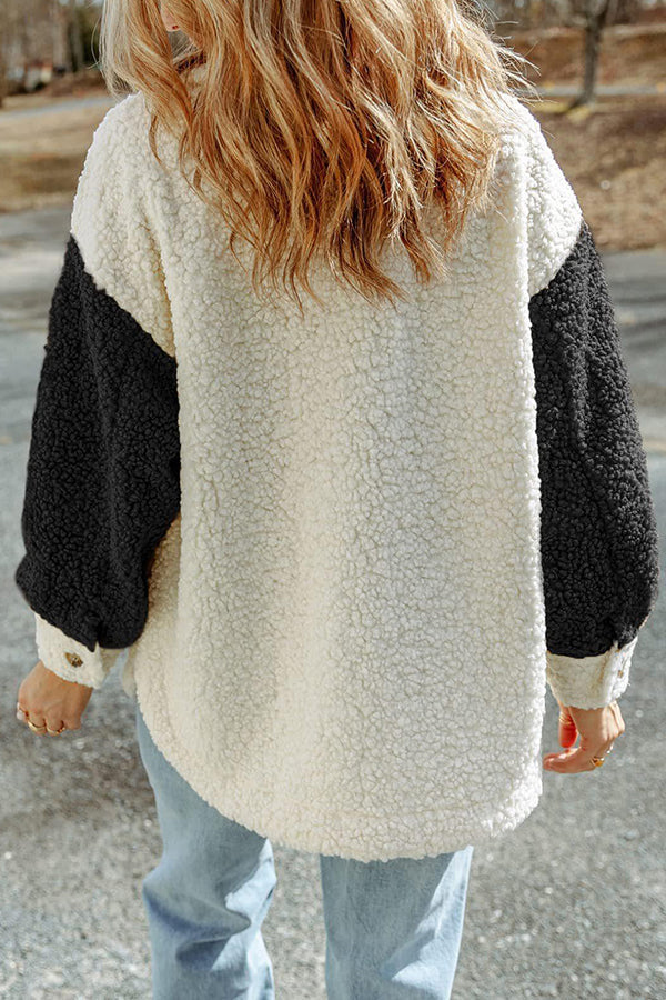 Abrigo de piel holgado con bloques de color y doble bolsillo de manga larga para otoño e invierno