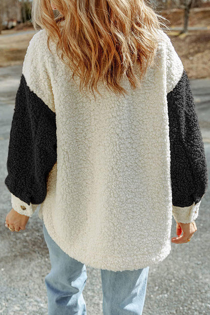 Abrigo de piel holgado con bloques de color y doble bolsillo de manga larga para otoño e invierno