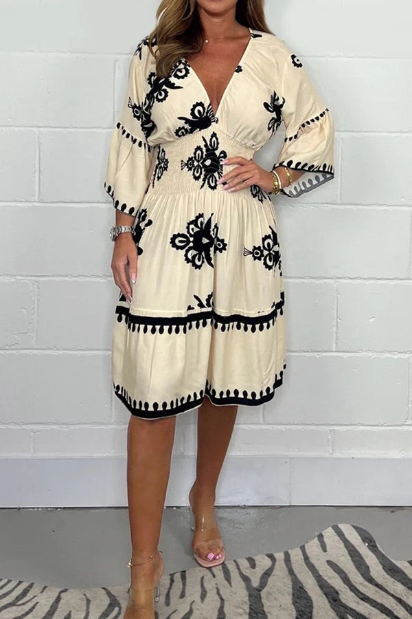 VESTIDO ESTAMPADO CON CUELLO EN V